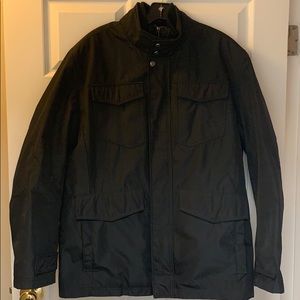 Andrew Marc Men’s black coat with zip out vest.